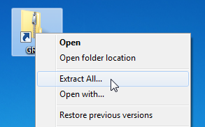 a zipped desktop folder showing the "extract all" option in the right-click dropdown menu.