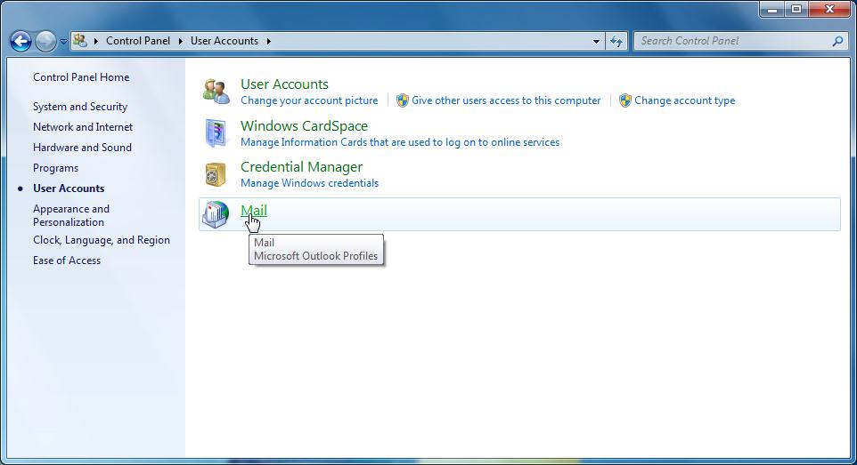 User Accounts section of the Control Panel, shown in Windows Explorer. There is a sidebar with nine links listed, they are called Control Panel Home, System and Security, Network and Internet, Hardware and Sound, Programs, User Accounts, Appearance and Personalization, Clock Language and Region, and Ease of Access. In the main part of the window, there are four sections called User Accounts, Windows CardSpace, Credential Manager, and Mail. The Mail section is highlighted with the cursor over it.