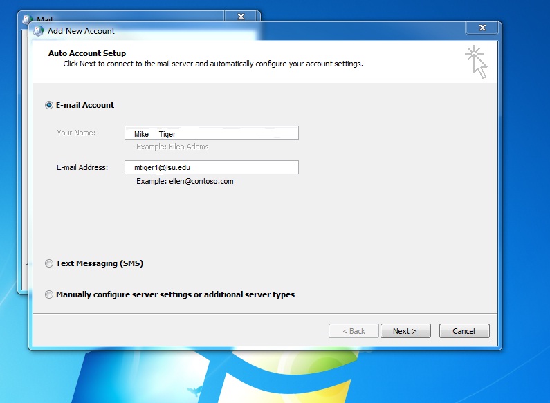 Add New Account window. There are three options for account settings called E mail account, text messaging SMS, and Manually configure server settings or additional server types. E mail account is selected. In the top box under E mail account, there is a text box for your name. In the box underneath this, there is a text box for your e mail address. At the bottom right of the window, there are three buttons called Back, Next, and Cancel. Clicking Next brings you to the next step.